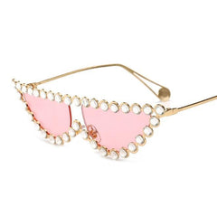 Gafas de sol con montura metálica brillante y elegante con diamantes