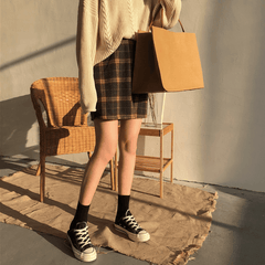 Falda corta con cremallera a cuadros escoceses