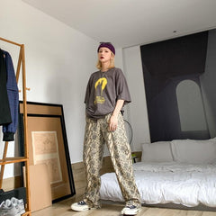 Übergroße Hose mit Schlangenmuster und elastischer Taille