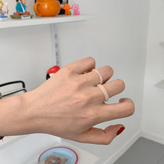 Sanfte, ästhetische Pastellfarben, winzige, einfache Ringe