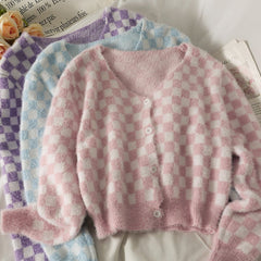 Cárdigan corto a cuadros en colores pastel para niña suave