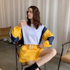 Conjunto deportivo de 2 piezas: sudadera con bloques de color y pantalones cortos holgados