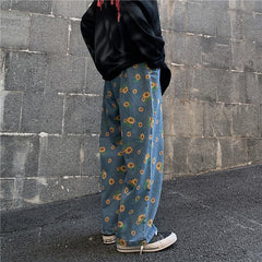Pantalones vaqueros extragrandes de color azul azadón con estampado de girasoles