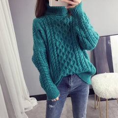 Suéter cálido de punto con cuello alto y trenzas gruesas