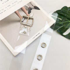 Transparenter ästhetischer Gummigürtel mit metallischen Löchern