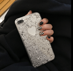 Funda para iPhone 7 con diseño de corazón plateado y copos metálicos transparentes