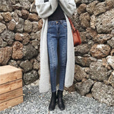 Blaue Skinny Jeans mit Dreieck-Nähmuster vorne