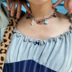 Collar con colgante de cadena y nota musical de mariposa de chica Tumblr