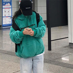 Türkisfarbenes, lockeres Kapuzen-Sweatshirt mit Retro-Aufdruck