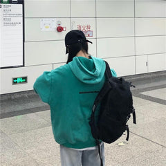 Türkisfarbenes, lockeres Kapuzen-Sweatshirt mit Retro-Aufdruck