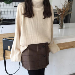 Suéter cálido y acogedor de manga larga de punto con cuello de tortuga