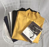 Blusa suelta de algodón de color liso con cuello de tortuga