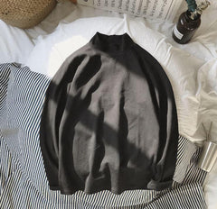 Blusa suelta de algodón de color liso con cuello de tortuga