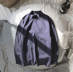 Blusa suelta de algodón de color liso con cuello de tortuga