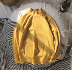 Blusa suelta de algodón de color liso con cuello de tortuga