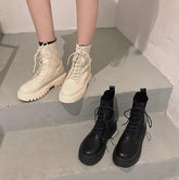 Botas vintage de lona hasta el tobillo color crema y negro