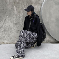 Lockere Hose mit Vintage-Muster und hoher Taille