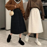 Warmer, langer Rock aus Lamm-Kunstpelz mit elastischer Taille