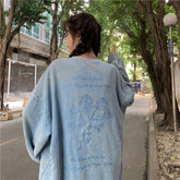 Sudadera extragrande con estampado de color liso y espalda azul lavada