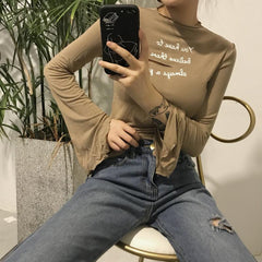 You Have To Believe Bust Cut Hole Long Sleeve Flared Blouse