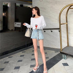 Shorts vaqueros con cremallera, cintura alta y bordes rasgados