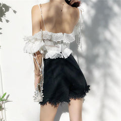 Pantalones cortos de mezclilla de cintura alta con cremalleras negras rasgadas