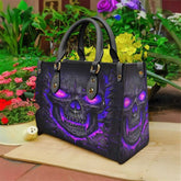 Bolso de mano de piel de lava con calavera morada