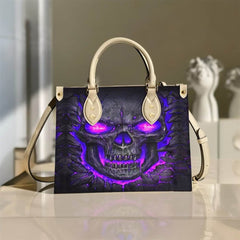 Lila Handtasche aus Lavaleder mit Totenkopf