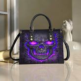 Bolso de mano de piel de lava con calavera morada
