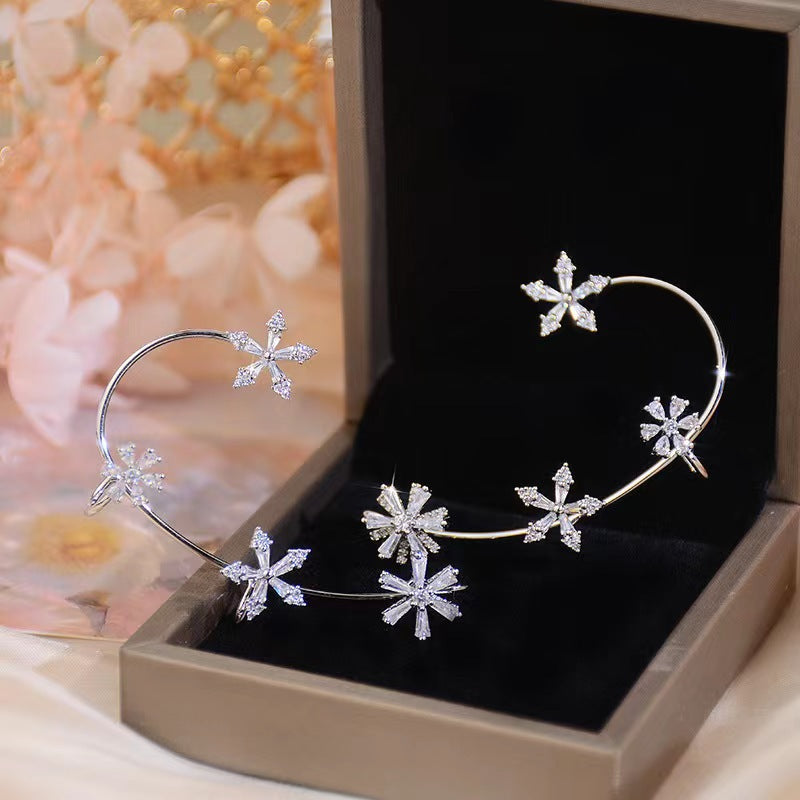 Rotating Snowflake Ear Cuff