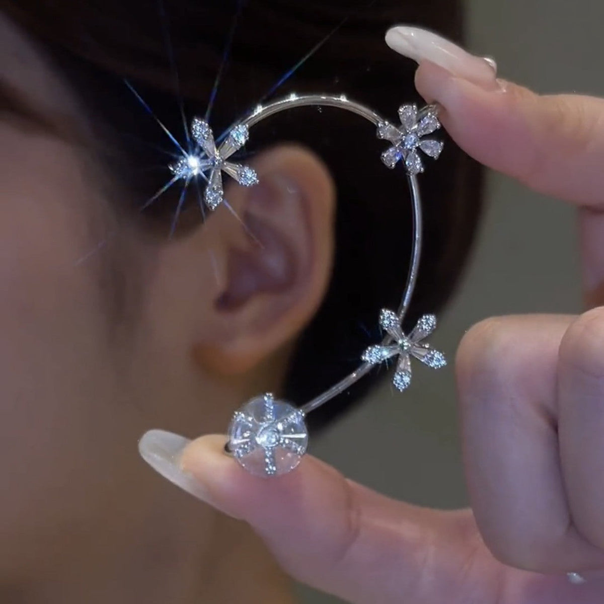 Rotating Snowflake Ear Cuff