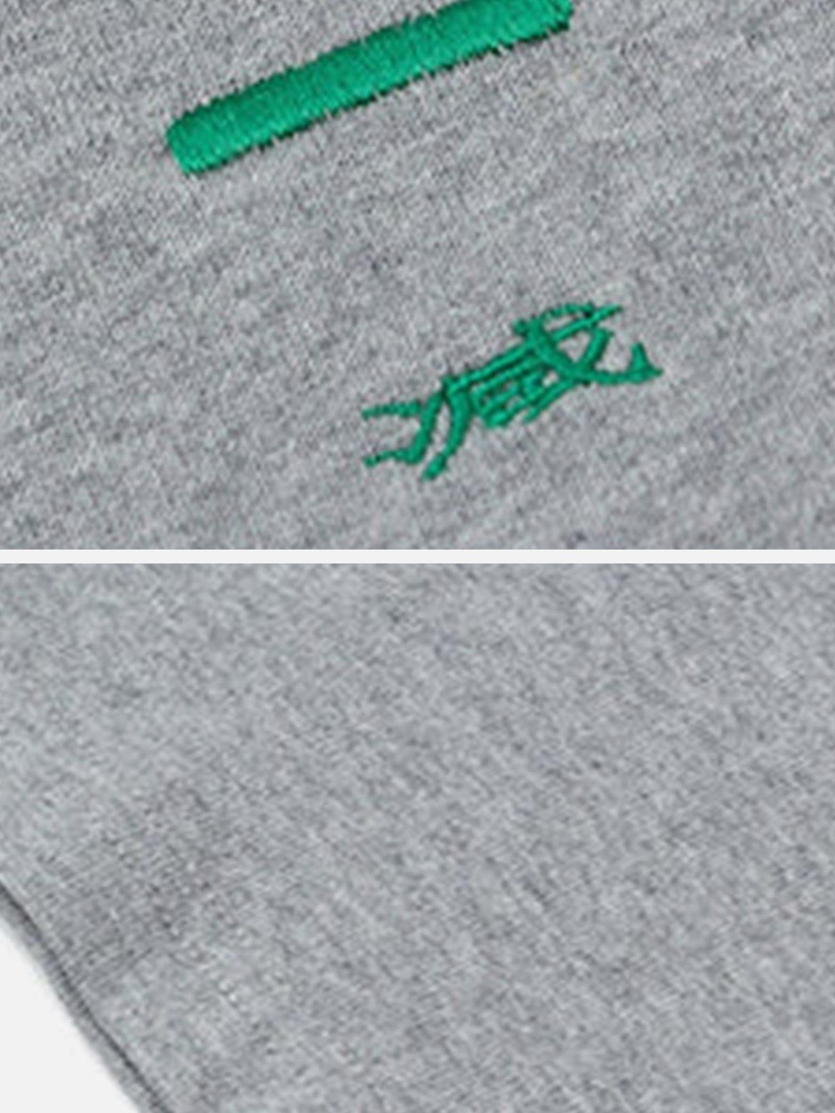 “X”Tee