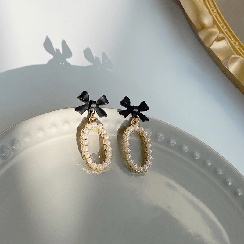 Bow Pearl Oval Earrings