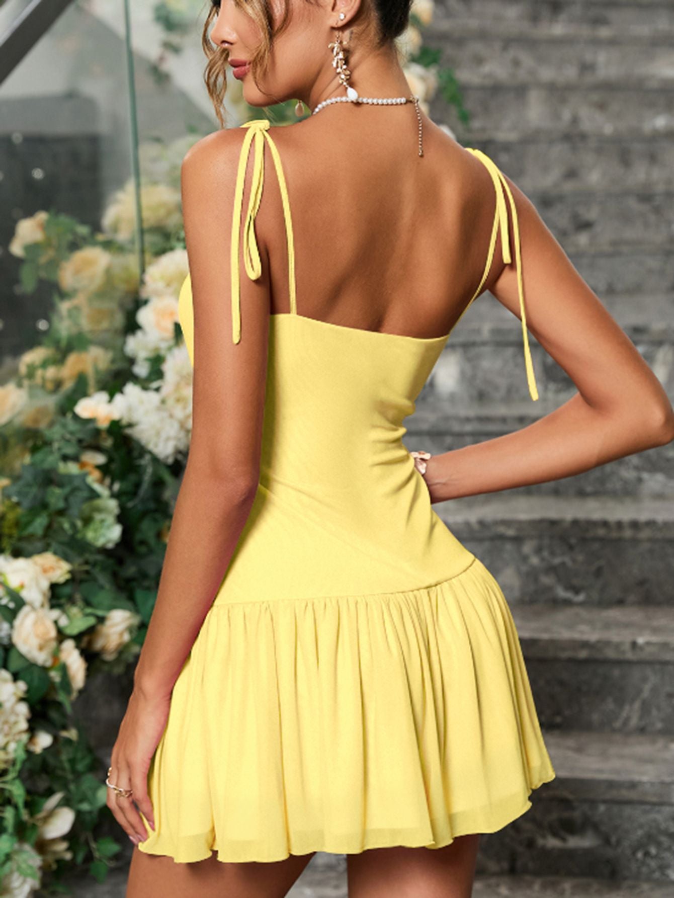 A Short Dress With Lace-Up Pleats