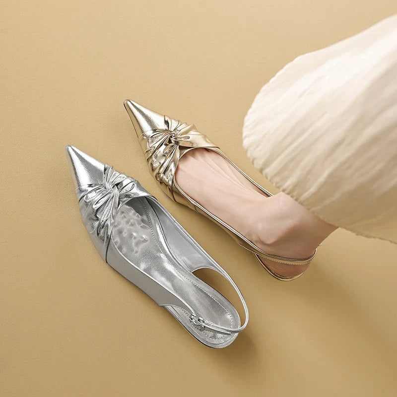 cowhide pointed toe wedge heel