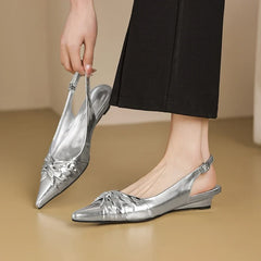 cowhide pointed toe wedge heel