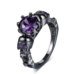 Gothic Purple Gemstone Ring with Sculpted Skulls