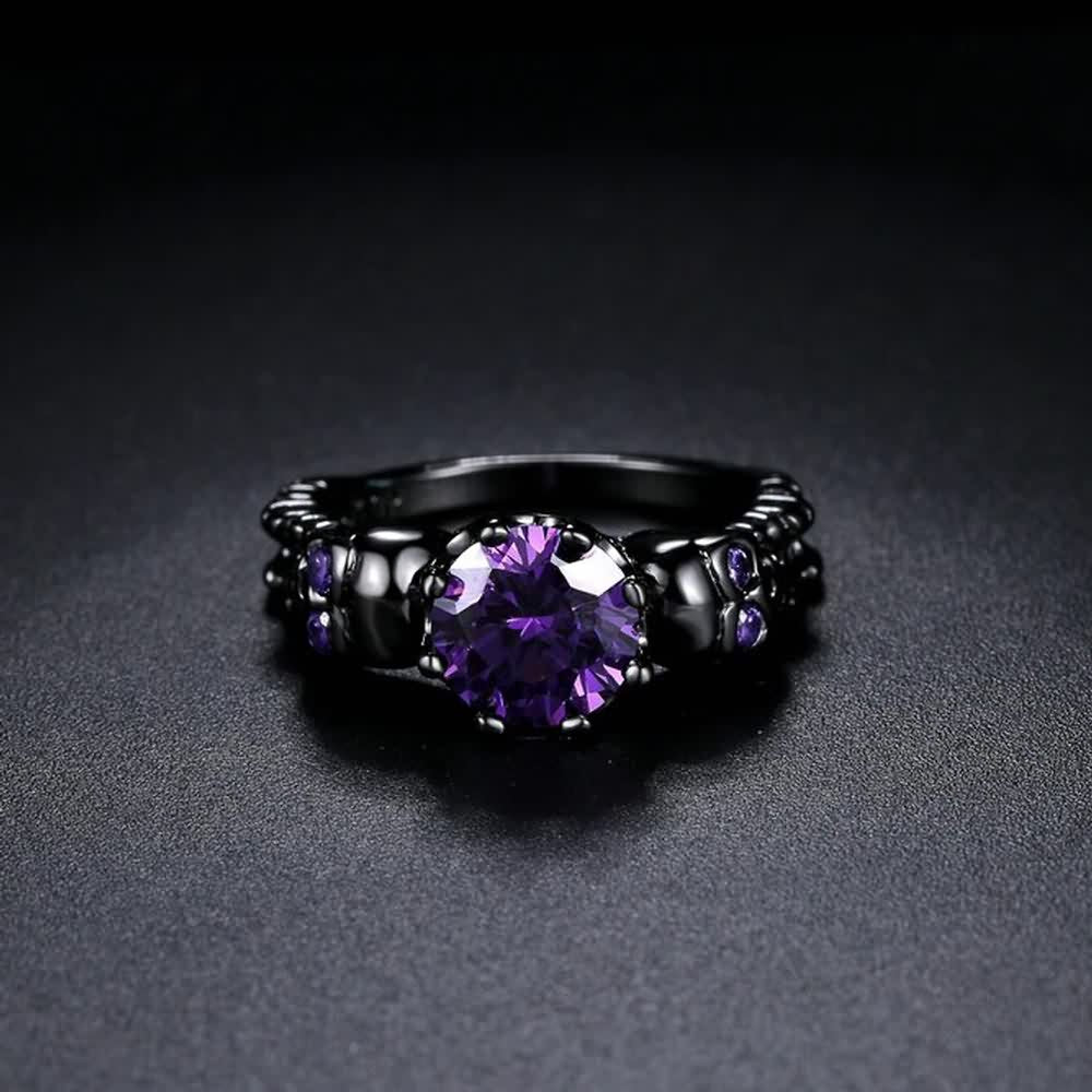 Gothic Purple Gemstone Ring with Sculpted Skulls