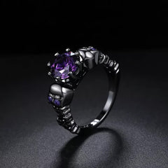 Gothic Purple Gemstone Ring with Sculpted Skulls