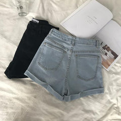 Venta de pantalones cortos vaqueros azules clásicos de cintura alta 